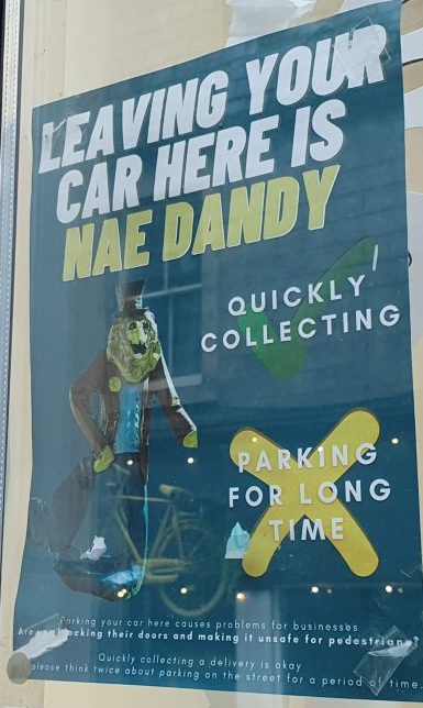 Poster saying "leaving your car here is nae dandy" with picture of Dandy Lion.