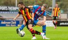 Partick Thistle's Steven Lawless and Inverness' Charlie Gilmour battle for the ball. Image: SNS.
