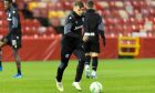 PAOK's Brandon Thomas in action during a training session at Pittodrie Stadium on Wednesday evening. Image: SNS .