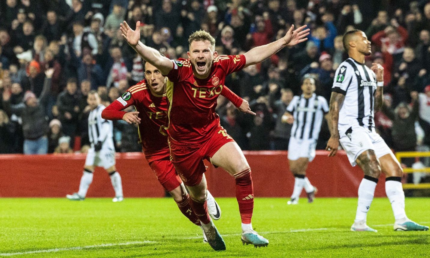 Aberdeen's Nicky Devlin celebrates after Bojan Miovski scores