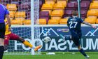 Ross County's Eamonn Brophy lets fly to give Ross County the lead at Motherwell. Images: Craig Hoy/SNS Group