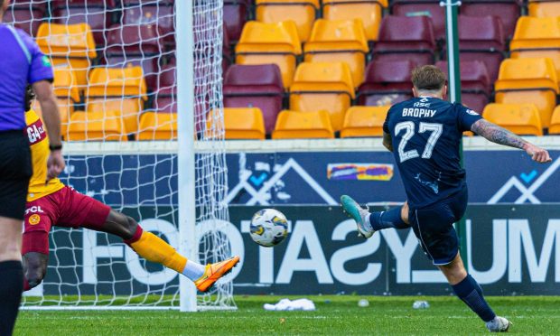 Ross County's Eamonn Brophy lets fly to give Ross County the lead at Motherwell. Image: SNS