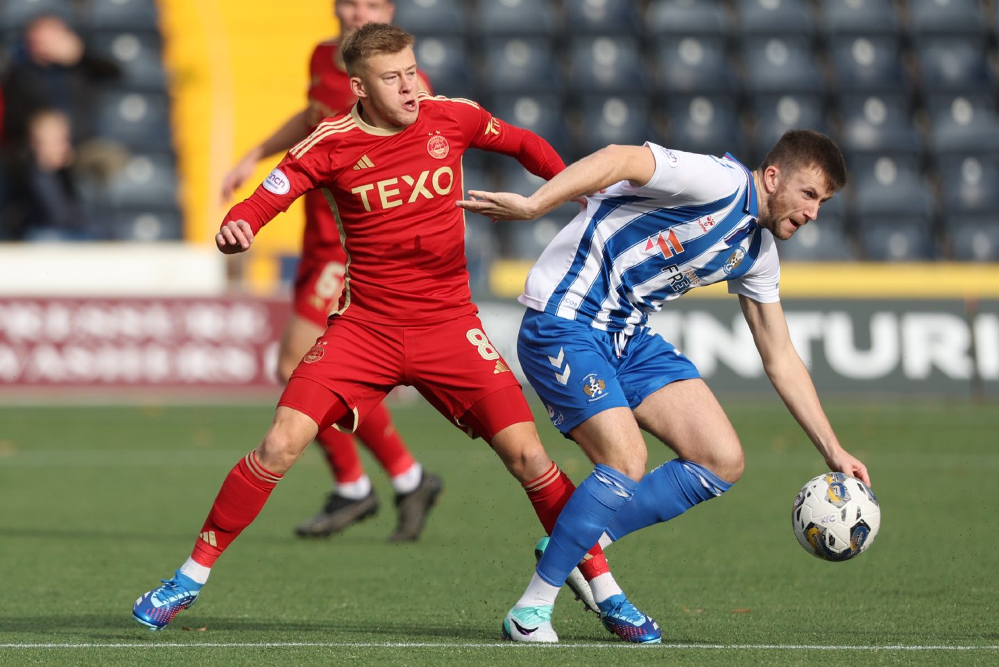 Aberdeen's Connor Barron and Kilmarnock's Liam Polworth in action