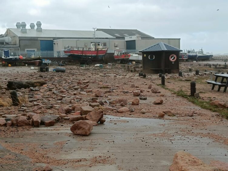 The aftermath of Storm Babet at Boddam Harbour.