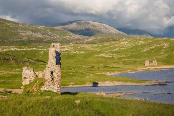 Far North Scotland has been chosen among the top 10 regions to travel to across the world in 2024. Picture shows; Ardvreck castle on loch Assynt. Supplied by Visit Scotland.