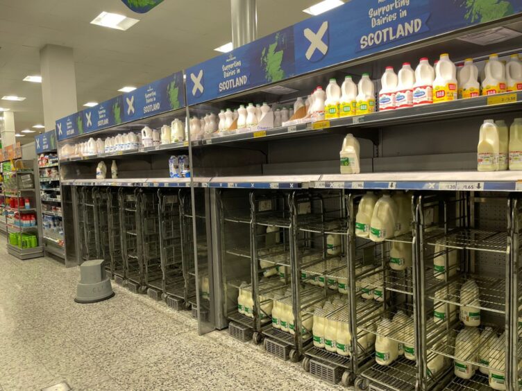 Empty milk shelves at Waitrose due to the storm.
