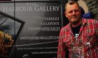 Stuart Herd with his art gallery van in Tarbert, Loch Fyne.