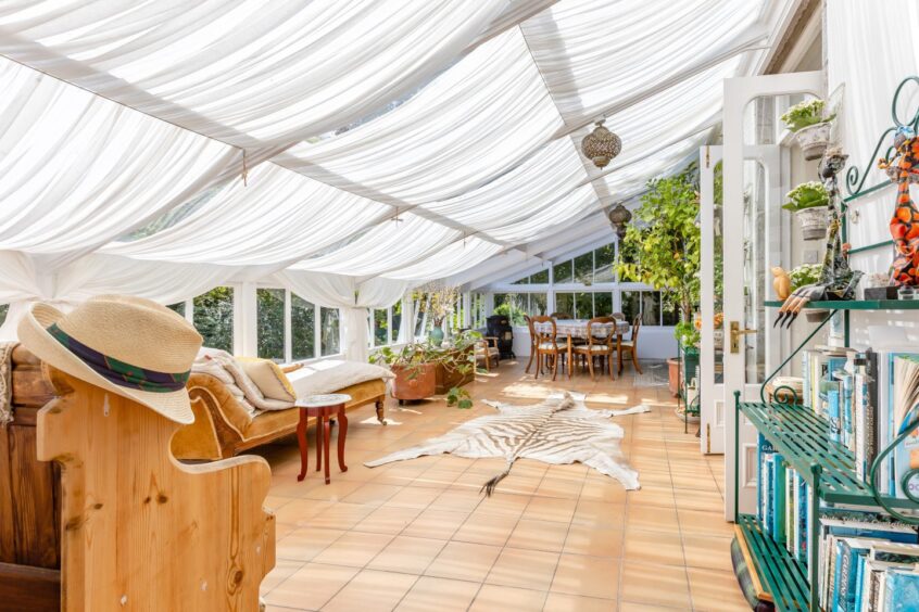 Spacious split level conservatory within the house for sale near Duthie Park.