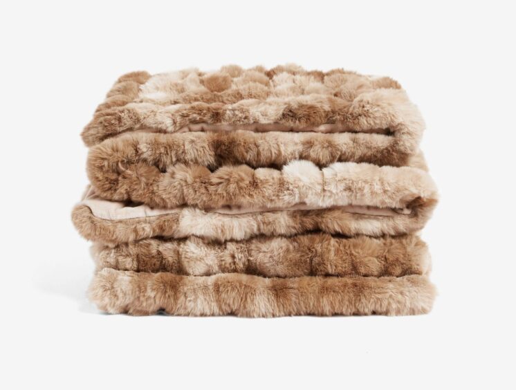 Light brown mink throw, perfect for decorating your home for autumn.