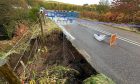 A957 road washed out after Storm Babet.