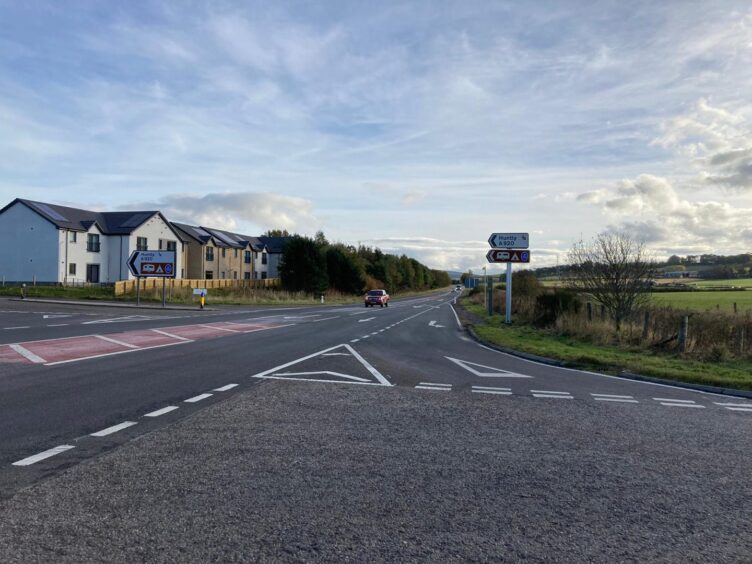 Another view of the dangerous A96 junction where the flashing signs were installed just one month ago.