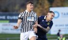Elgin City defender Jake Dolzanski, left, competes for the ball with Dumbarton's Ross MacLean. Image: Bob Crombie
