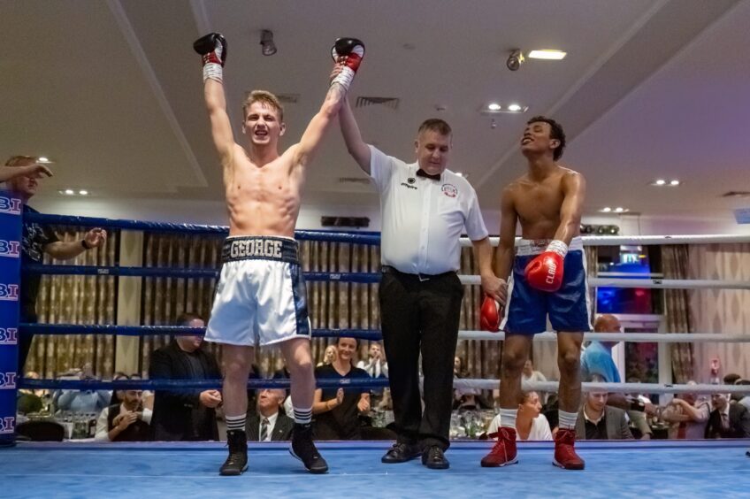 George Stewart, left, after recently beating Miguel Zamora at the Drumossie Hotel