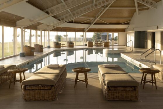 Coast Spa's pool offers stunning views of the coast with floor to ceiling windows