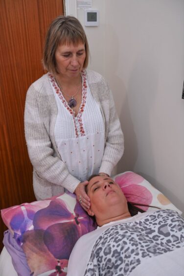 Wendy Riley with a client during a hypnotherapy session Aberdeen