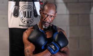 George Taylor is planning on taking on a white collar boxing match at the Beach Ballroom. George is pictured in his boxing gloves.