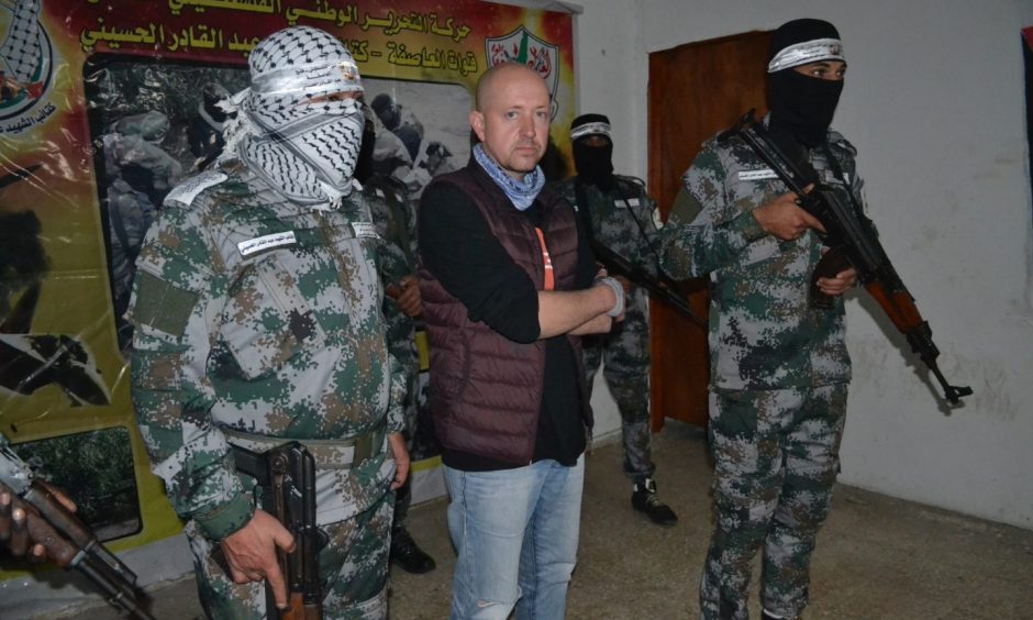 George met with the armed masked men of the Abd al-Qadir al-Husayni Brigades inside the Gaza Strip. Image: George Mitchell.