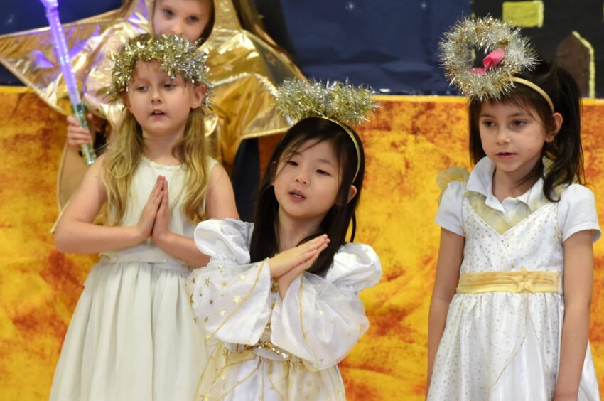 Young girls dressed as angels for the Nativity Christmas Concert