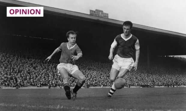 Manchester United's Bobby Charlton (left) crosses the ball with Arsenal's Bill Dodgin right at Old Trafford in 1958 or 1959 (Image: Colorsport/Shutterstock)