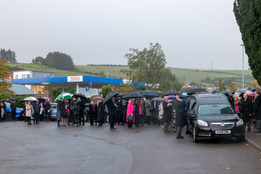 The funeral goers pay their respects at Kirsteen Maclennan's funeral.