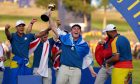 Team Europe's Robert MacIntyre lifts the Ryder Cup trophy.  Image: PA.