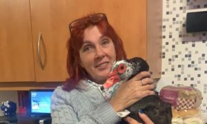 Fran Hutton with her Muscovy duck dave