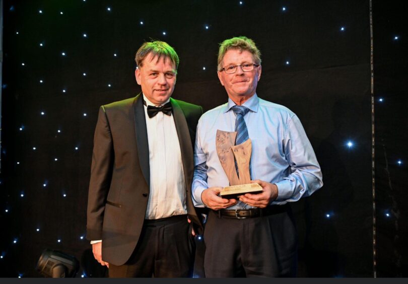 Gordon Gerrie, of Monarch Builds, right, with his award. Pictured with him is Bruce Allan, of Malcolm Allan Housebuilders.