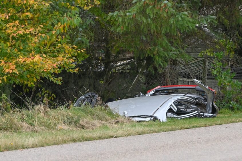 The car roof was cut off and left on the grass verge of the B9102