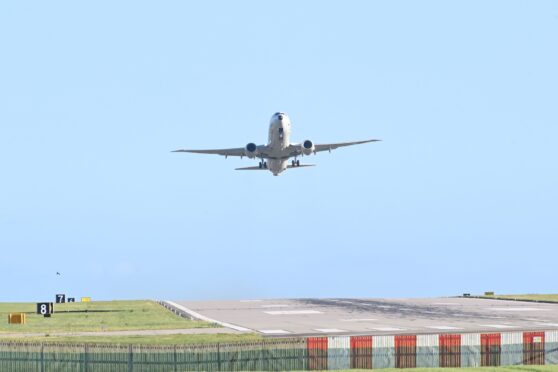 A P8 leaving RAF Lossiemouth this morning. Image: Jason Hedges/DC Thomson