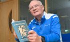 Charles Bannerman, with his book, A Running Jump, which explores north athletics' development. Image: Jason Hedges/DC Thomson.