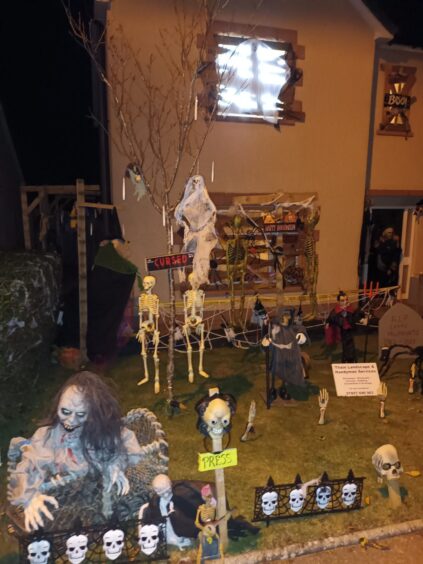 Scary figures and boarded up windows as part of Jamie Thain's Halloween decor.