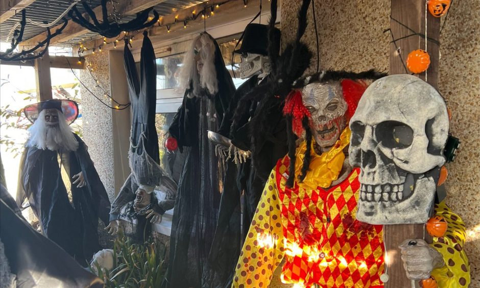 Close up of scary figures outside the Aberdeenshire home for October 31.