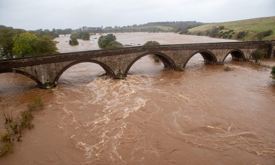 High water levels at Northwater Bridge, Aberdeenshire, due to Storm Babet.