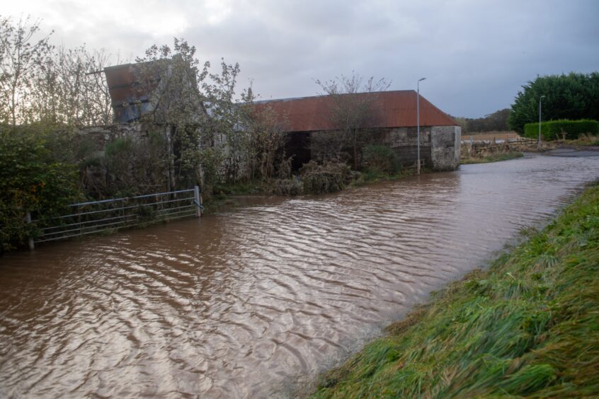 Another view of the flooded A937, Marykirk.