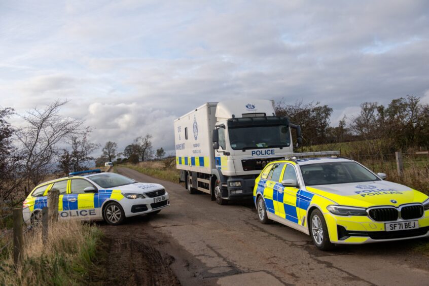 Police vehicles at Marykirk search