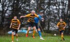 Stonehaven's Ross Mitchell up for a header against Hermes. Image: Kath Flannery/DC Thomson