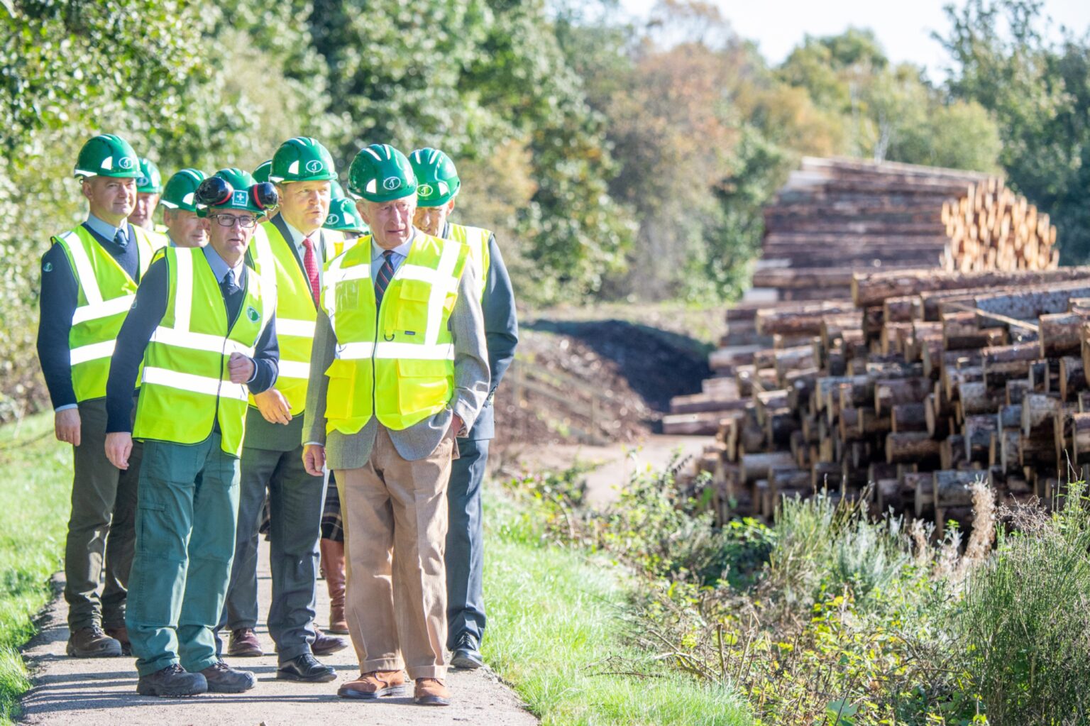 King Charles dons hard hat and highvis jacket at sawmill in Aboyne
