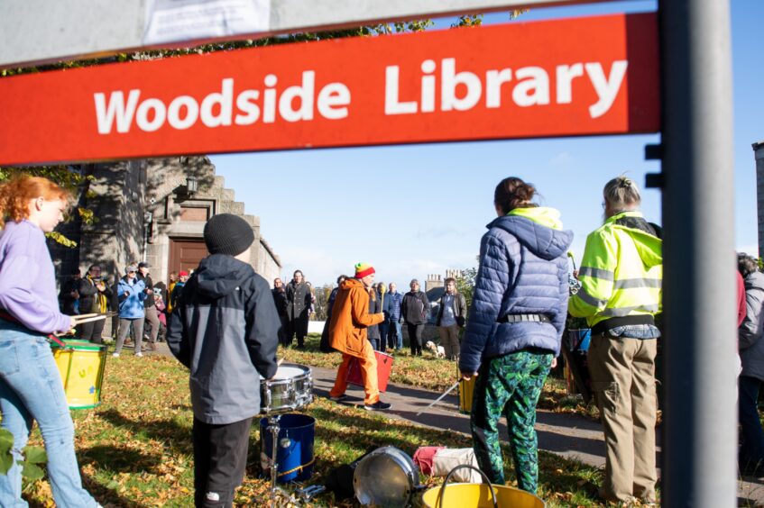 A crowd gathered to celebrate Woodside Library's 140th birthday