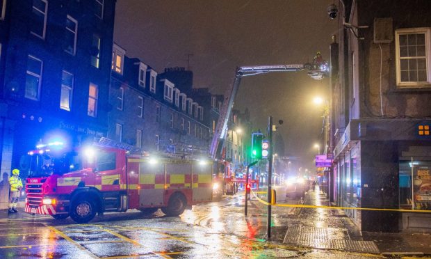 Firefighters on George Street in Aberdeen. Image: Kami Thomson/DC Thomson