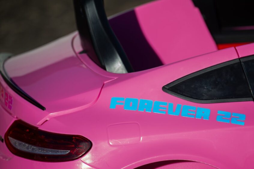 "Forever 22" sticker on mini car.