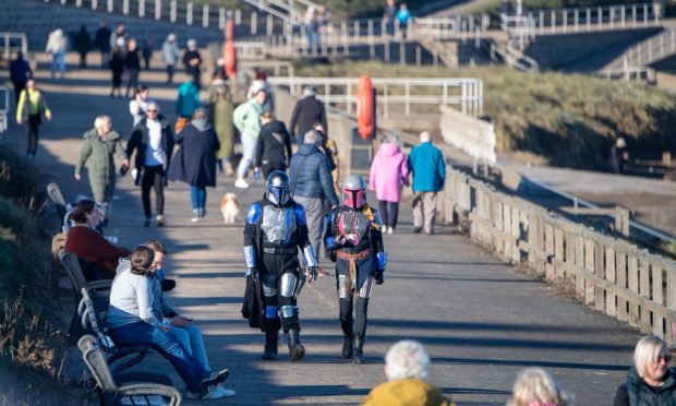 Star Wars fans were seen at a busy Aberdeen beach now that the weather has turned from Storm Babet.