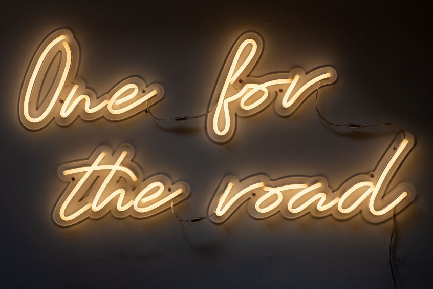 LED neon sign that reads: "One for the road".