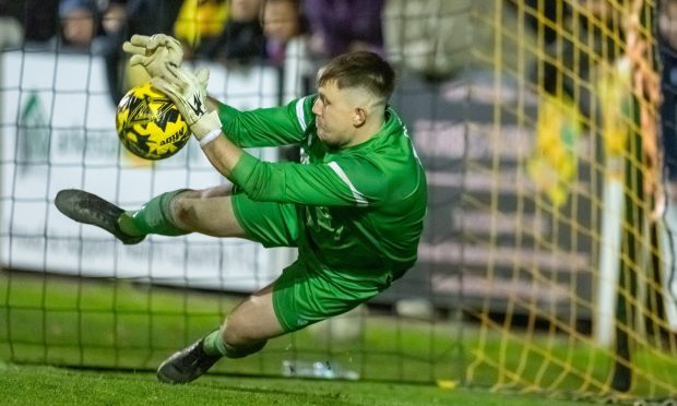Dylan MacLean saves Zak Delaney's penalty to earn Nairn County a win against ICT and a place in the North of Scotland Cup final against Ross County. Images: Jasperimage