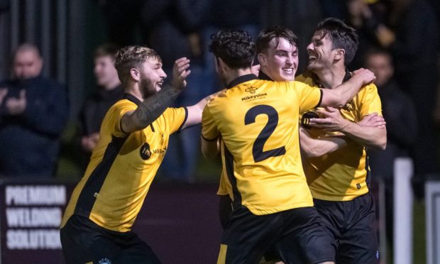 Nairn County celebrate their North of Scotland Cup triumph over Caley Thistle. Image: Jasperimage