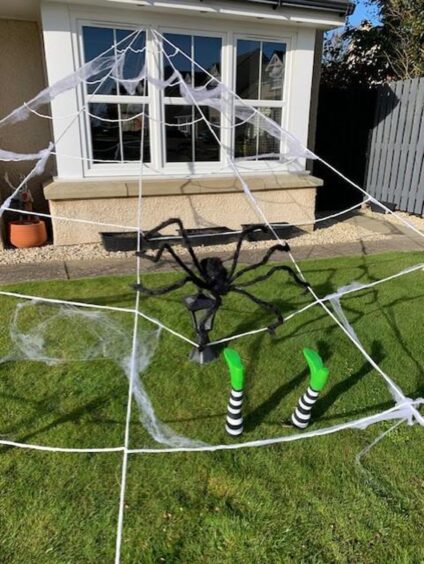 Spider and web Halloween decoration outside Nicola Freeland's house.