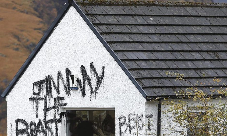 The vandalised Glencoe house that was owned by sexual predator Jimmy Savile.