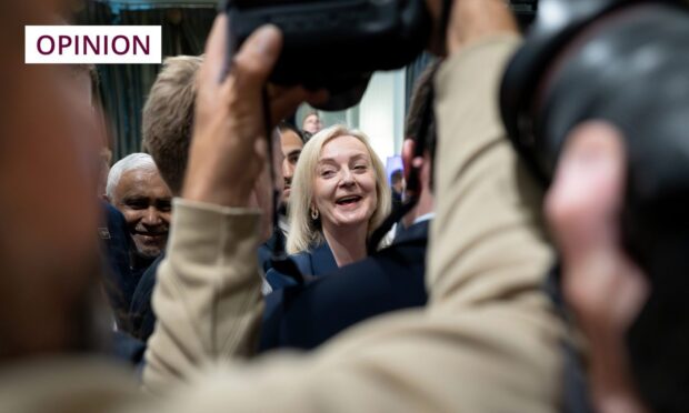 Former prime minister Liz Truss leaves the Great British Growth Rally, a fringe event where she spoke during the Conservative Party conference in Manchester (Image: Stefan Rousseau/PA Wire)