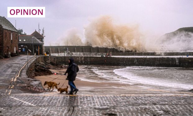 Waves rage in Stonehaven, where flood defences held, during Storm Babet (Image: Darrell Benns/DC Thomson)