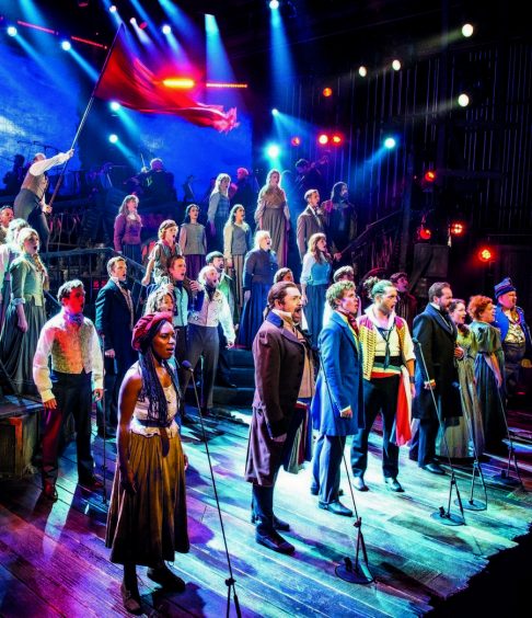 The cast of the West End production take to the stage to perform in London.