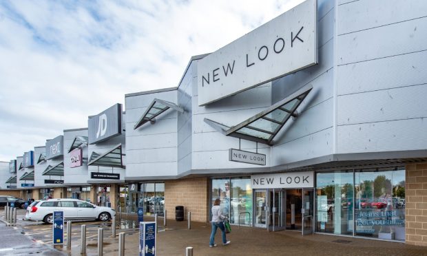 General view outside New Look retail store in Elgin.